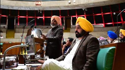 Finance minister Harpal Singh Cheema presenting the Punjab budget as chief minister Bhagwant Mann looks on in the Vidhan Sabha on Tuesday. (Ravi Kumar/HT) Finance minister Harpal Singh Cheema presenting the Punjab budget as chief minister Bhagwant Mann looks on in the Vidhan Sabha on Tuesday. (Ravi Kumar/HT)