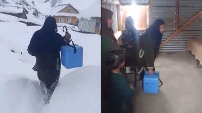 A health worker with a polio vaccine box walking through deep snow to administer polio drops to children. (X/@airnewsalerts) A health worker with a polio vaccine box walking through deep snow to administer polio drops to children. (X/@airnewsalerts)
