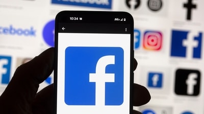FILE - The Facebook logo is seen on a cell phone in Boston, USA, Oct. 14, 2022. Users of Meta's Facebook, Instagram, Threads and Messenger platforms are experiencing login issues in what appears to be a widespread outage. (AP Photo/Michael Dwyer, File) (AP) FILE - The Facebook logo is seen on a cell phone in Boston, USA, Oct. 14, 2022. Users of Meta's Facebook, Instagram, Threads and Messenger platforms are experiencing login issues in what appears to be a widespread outage. (AP Photo/Michael Dwyer, File) (AP)