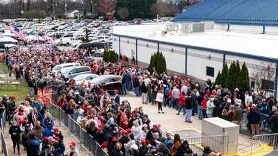 Attendees wait in line ahead of a "Get Out The Vote" rally with former US President Donald Trump in Greensboro, North Carolina, US, on Saturday, March 2, 2024. Trump�said he will impose tit-for-tat tariffs if he is reelected president, reiterating one of his isolationist policy goals that has already raised concern�at home�and overseas.� Photographer: Al Drago/Bloomberg (Bloomberg) Attendees wait in line ahead of a "Get Out The Vote" rally with former US President Donald Trump in Greensboro, North Carolina, US, on Saturday, March 2, 2024. Trump�said he will impose tit-for-tat tariffs if he is reelected president, reiterating one of his isolationist policy goals that has already raised concern�at home�and overseas.� Photographer: Al Drago/Bloomberg (Bloomberg)