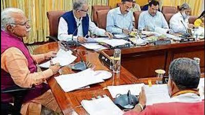 The Haryana Cabinet, chaired by chief minister Manohar Lal Khattar, approved a policy granting proprietary rights for residential land or plots to occupants in four villages in Hisar - Dhandoor, Peeranwali, Jhiri (Chikanwas), and Babran (Basti and Diggi Tal). (HT Photo) The Haryana Cabinet, chaired by chief minister Manohar Lal Khattar, approved a policy granting proprietary rights for residential land or plots to occupants in four villages in Hisar - Dhandoor, Peeranwali, Jhiri (Chikanwas), and Babran (Basti and Diggi Tal). (HT Photo)