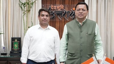 Uttam Rawat (left) with Uttarakhand CM, Pushkar Singh Dhami. Rawat was recently made co-convenor of state BJP's foreign cell. The other co-convenors of the cell are residents of Uttarakhand. (Courtesy Uttam Rawat) Uttam Rawat (left) with Uttarakhand CM, Pushkar Singh Dhami. Rawat was recently made co-convenor of state BJP's foreign cell. The other co-convenors of the cell are residents of Uttarakhand. (Courtesy Uttam Rawat)