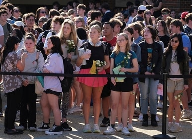 University of Georgia students gather at the Tate Plaza on campus in Athens, Ga., Monday, Feb. 26, 2024, to pay tribute to Laken Riley (Nell Carroll/Atlanta Journal-Constitution via AP) (AP) University of Georgia students gather at the Tate Plaza on campus in Athens, Ga., Monday, Feb. 26, 2024, to pay tribute to Laken Riley (Nell Carroll/Atlanta Journal-Constitution via AP) (AP)
