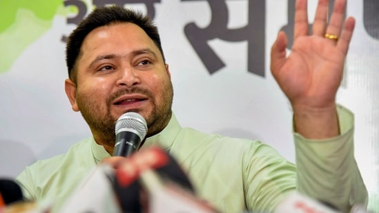 Patna: Former Bihar Deputy CM and RJD MLA Tejashwi Yadav addresses a press conference at his residence. (PTI)
