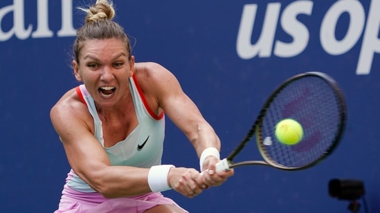 Simona Halep, of Romania, returns a shot (AP)