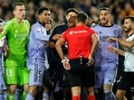 Real Madrid's Jude Bellingham, third left, remonstrates after his goal was disallowed Real Madrid's Jude Bellingham, third left, remonstrates after his goal was disallowed