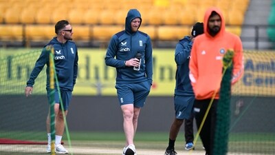 England's captain Ben Stokes (C) and coach Brendon McCullum (L) arrive to inspect the match pitch (AFP) England's captain Ben Stokes (C) and coach Brendon McCullum (L) arrive to inspect the match pitch (AFP)