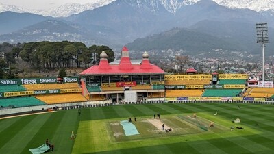 A general view of the Himachal Pradesh Cricket Association Stadium shows India's players attending a practice session (AFP) A general view of the Himachal Pradesh Cricket Association Stadium shows India's players attending a practice session (AFP)