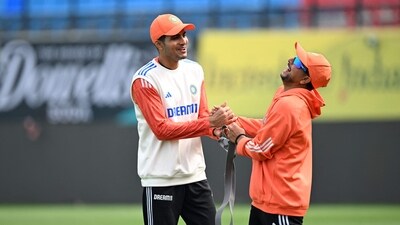 India's Shubman Gill and Kuldeep Yadav (R) gesture as they take part in a practice session. Should Kuldeep make way for Jasprit Bumrah? (AFP) India's Shubman Gill and Kuldeep Yadav (R) gesture as they take part in a practice session. Should Kuldeep make way for Jasprit Bumrah? (AFP)