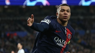 Paris Saint-Germain's French forward Kylian Mbappe celebrates scoring his team's second goal during the UEFA Champions League match vs Real Sociedad (AFP)
