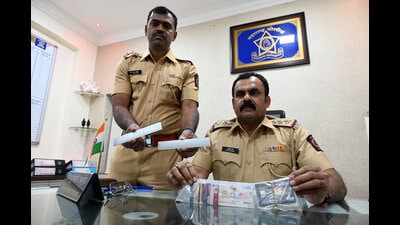 Navi Mumbai, India - March 6, 2024:Bank manager prevents ATM fraud , during press conference Vashi police arrest two people and seize ATM Card at Vashi police Station Navi Mumbai, India, on Wednesday, March 6, 2024. (Photo by Bachchan Kumar/ HT PHOTO) (HT PHOTO) Navi Mumbai, India - March 6, 2024:Bank manager prevents ATM fraud , during press conference Vashi police arrest two people and seize ATM Card at Vashi police Station Navi Mumbai, India, on Wednesday, March 6, 2024. (Photo by Bachchan Kumar/ HT PHOTO) (HT PHOTO)