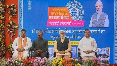 PM Modi with West Bengal Governor C.V. Ananda Bose during the inauguration and foundation stone laying ceremony of various developmental projects, in Kolkata. (PTI) PM Modi with West Bengal Governor C.V. Ananda Bose during the inauguration and foundation stone laying ceremony of various developmental projects, in Kolkata. (PTI)