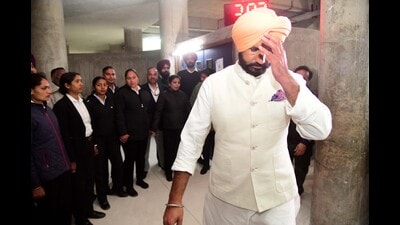 Punjab Congress chief Amarinder Singh Raja Warring coming out of assembly after being suspended in Chandigarh on Wednesday. (Ravi Kumar/HT) Punjab Congress chief Amarinder Singh Raja Warring coming out of assembly after being suspended in Chandigarh on Wednesday. (Ravi Kumar/HT)