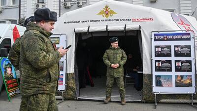 Russian Army servicemen stand near a mobile recruiting centre, during an exhibition of military hardware used in the course of the Russia-Ukraine conflict, as it arrived on a train promoting the Russian army, in Rostov-on-Don, Russia, on March 3. (REUTERS) Russian Army servicemen stand near a mobile recruiting centre, during an exhibition of military hardware used in the course of the Russia-Ukraine conflict, as it arrived on a train promoting the Russian army, in Rostov-on-Don, Russia, on March 3. (REUTERS)