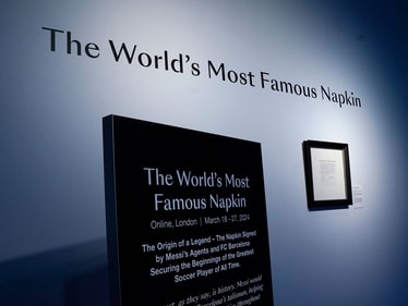 A napkin on which was written the first promise of a contract to secure 13-year-old Lionel Messi for FC Barcelona, is on display at Bonhams, New York, on March 5, 2024. The napkin written by Barcelona's Sporting Director Carles Rexach on December 14, 2000, will be sold during an online auction by the Bonhams auction house from March 18-27. (AFP) A napkin on which was written the first promise of a contract to secure 13-year-old Lionel Messi for FC Barcelona, is on display at Bonhams, New York, on March 5, 2024. The napkin written by Barcelona's Sporting Director Carles Rexach on December 14, 2000, will be sold during an online auction by the Bonhams auction house from March 18-27. (AFP)