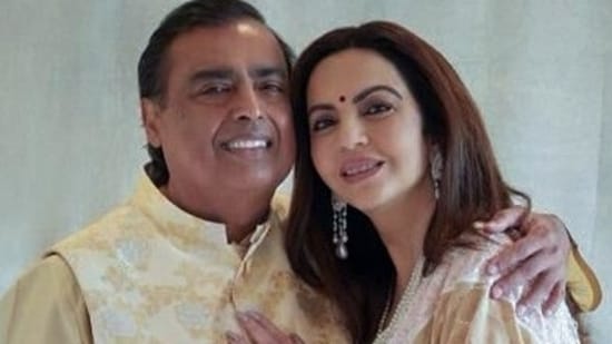 Mukesh Ambani and Nita Ambani pose for a picture during the pre-wedding celebrations of their son Anant Ambani and Radhika Merchant in held in Jamnagar recently.(ANI)