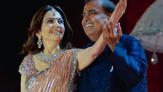 In this photo from Anant Ambani and Radhika Merchant's pre-wedding festivities, Mukesh Ambani and his wife Nita Ambani can be seen participating in their son's grand celebrations in Jamnagar.(ANI)