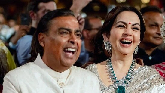 Mukesh Ambani gets teary eyed when his daughter-in-law Radhika Merchant walks down the aisle to his son Anant Ambani.(ANI)