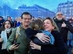 Pro-abortion supporters hug each other after French lawmakers have approved a bill that will enshrine a woman’s right to an abortion in the French Constitution, at Trocadero Plaza in Paris, Monday, March 4, 2024. The vote makes France the first country to have a constitutional right to abortion since the former Yugoslavia inscribed it in its 1974 constitution. (AP Photo/Oleg Cetinic)