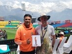 Andy Brown poses with Rahul Dravid. Andy Brown poses with Rahul Dravid.