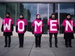 FILE - Women attend a protest marking International Women's Day, March 8, 2023, in Berlin, Germany. Women across the world will demand equal pay, reproductive rights, education, justice and other essential needs during demonstrations marking International Women’s Day on Friday, March 8, 2024. (AP Photo/Markus Schreiber, File)