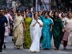 West Bengal chief minister Mamata Banerjee leads a procession on the eve of International Women's Day in Kolkata on March 7. West Bengal chief minister Mamata Banerjee leads a procession on the eve of International Women's Day in Kolkata on March 7.