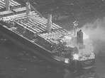 In this image obtained from the US Central Command (CENTCOM) on March 6, 2024, shows the Barbados-flagged, Liberian-owned bulk carrier after it was hit by anti-ship ballistic missile (ASBM) launched from Iranian-backed Houthi rebels. 