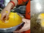 The image, taken from the video shared on X, shows the woman making kaju katli pakoda. 