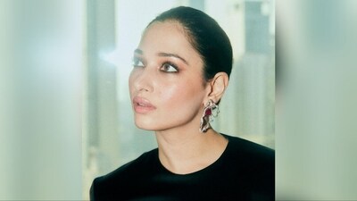 With the help of makeup artist Florian Hurel, Tamannaah got decked up in nude eyeshadow, mascaraed lashes, kohl eyes, blushed cheeks, glowing highlighter and a shade of glossy nude lipstick. With her luscious locks tied up in a neat bun, she finished off her look. (Instagram/@tamannaahspeaks) With the help of makeup artist Florian Hurel, Tamannaah got decked up in nude eyeshadow, mascaraed lashes, kohl eyes, blushed cheeks, glowing highlighter and a shade of glossy nude lipstick. With her luscious locks tied up in a neat bun, she finished off her look. (Instagram/@tamannaahspeaks)