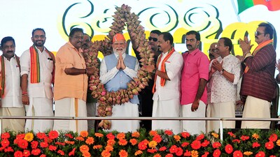 Thiruvananthapuram, Feb 27 (ANI): Prime Minister Narendra Modi being felicitated during a public meeting, in Thiruvananthapuram on Tuesday. Union Minister of State for External Affairs V Muraleedharan and Kerala Bharatiya Janata Party (BJP) Chief K Surendran are also seen. (ANI Photo) (Sreeram DK) Thiruvananthapuram, Feb 27 (ANI): Prime Minister Narendra Modi being felicitated during a public meeting, in Thiruvananthapuram on Tuesday. Union Minister of State for External Affairs V Muraleedharan and Kerala Bharatiya Janata Party (BJP) Chief K Surendran are also seen. (ANI Photo) (Sreeram DK)