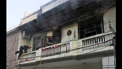 Fire-fighters trying to control the broke out in a house in Sarabha Nagar in Ludhiana on Thursday, March 07, 2024. (Gurpreet Singh/HT Photo)