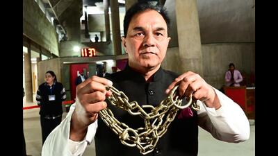 MLA Raj Kumar Chabbewal showing chains during a media interaction. (Ravi Kumar/HT) MLA Raj Kumar Chabbewal showing chains during a media interaction. (Ravi Kumar/HT)
