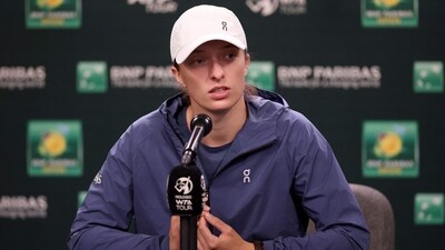 Iga Swiatek of Poland fields questions from the media. (Getty Images via AFP) Iga Swiatek of Poland fields questions from the media. (Getty Images via AFP)