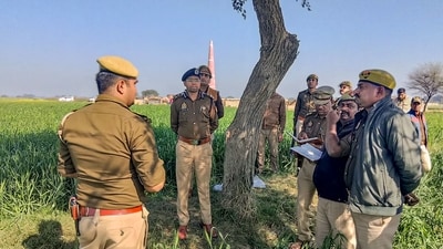Two minor girls were found hanging from a tree at a brick Kiln in the village of Barauli in the Ghatampur area of Kanpur in Uttar Pradesh on February 28. (PTI) Two minor girls were found hanging from a tree at a brick Kiln in the village of Barauli in the Ghatampur area of Kanpur in Uttar Pradesh on February 28. (PTI)