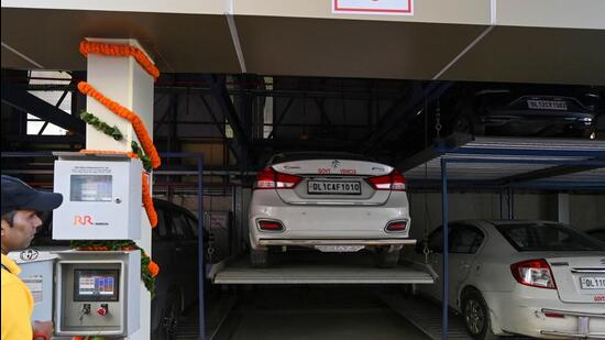 The multi-level parking lot at Amar Colony was recently inaugurated. (Sanchit Khanna/HT Photo)