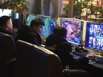 People play online games in an internet cafe in Fuyang in central China's Anhui province Friday, March 1, 2019. China's authority in charge of press and publications has approved 150 online games, saying it fully supports the industry after newly proposed curbs caused massive losses for major game companies. The National Press and Publication Administration issued a statement on its Weibo social media account Monday, Dec. 25, 2023, saying the approvals demonstrate active support for the development of online games.(Chinatopix via AP) People play online games in an internet cafe in Fuyang in central China's Anhui province Friday, March 1, 2019. China's authority in charge of press and publications has approved 150 online games, saying it fully supports the industry after newly proposed curbs caused massive losses for major game companies. The National Press and Publication Administration issued a statement on its Weibo social media account Monday, Dec. 25, 2023, saying the approvals demonstrate active support for the development of online games.(Chinatopix via AP)