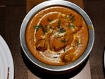 Picture of a freshly prepared butter chicken dish.