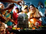 Devotees offer prayers at a Hanuman mandir on the occasion of Maha Shivaratri festival, at Sector 20, Noida.(Photo by Sunil Ghosh / Hindustan Times)