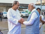 Prime Minister Narendra Modi being welcomed by Odisha Chief Minister Naveen Patnaik upon his arrival at Chandikhol, in Jajpur district, on March 5