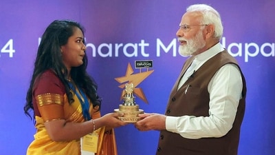 PM Narendra Modi presents the best storyteller award to Keerthika Govindasamy during the National Creators Award. (ANI)