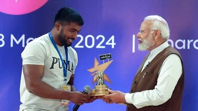 PM Narendra Modi presents the Best Health and Fitness Creator award to Ankit Baiyanpuria during the National Creators Award. (ANI)