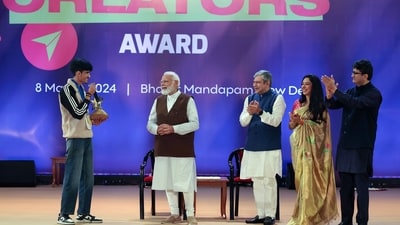 PM Narendra Modi presents the Best Nano Creator award to Piyush Purohit during the National Creators Award. (ANI)