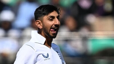 England's Shoaib Bashir celebrate after the dismissal of India's Sarfaraz Khan off the very first ball of the third and final session of the day (AFP) England's Shoaib Bashir celebrate after the dismissal of India's Sarfaraz Khan off the very first ball of the third and final session of the day (AFP)