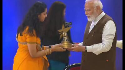 Content creator Janhvi Singh of U.P.’s Prayagraj receiving the award from PM Narendra Modi in New Delhi on March 8. (Sourced)