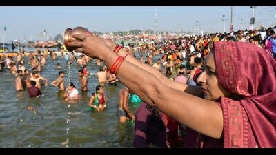 Devotees at the Sangam on Mahashivratri on Friday. (Anil Kumar Maurya/HT)