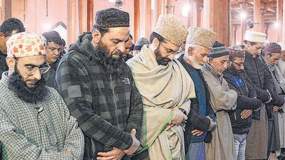 Jamia Masjid chief priest Mirwaiz Umar Farooq (third from left) offering Friday prayers after five months, in Srinagar. (PTI) Jamia Masjid chief priest Mirwaiz Umar Farooq (third from left) offering Friday prayers after five months, in Srinagar. (PTI)