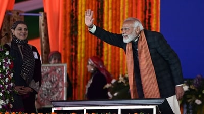 Prime Minister Narendra Modi waves at a public during the launch of various projects in Srinagar. (HT photo) Prime Minister Narendra Modi waves at a public during the launch of various projects in Srinagar. (HT photo)