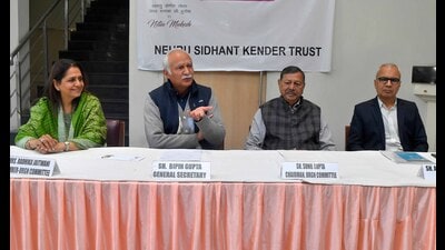 Members of Nehru Sidhant Kender Trust addressing media in Ludhiana on Friday. (Manish/HT Photo)