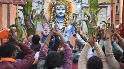 Devotees offer prayers at a Shiva temple on Maha Shivratri in Moradabad. (PTI)