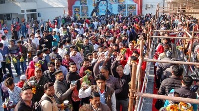 Devotees wait to offer prayers at a Shiv temple on the occasion of Mahashivratri festival in Amritsar. (PTI)